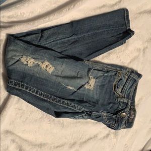 Silver jeans, rips, skinny.